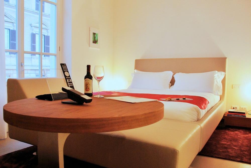 Palazzo Montemartini Rome, A Radisson Collection Hotel ภายนอก รูปภาพ A typical studio apartment