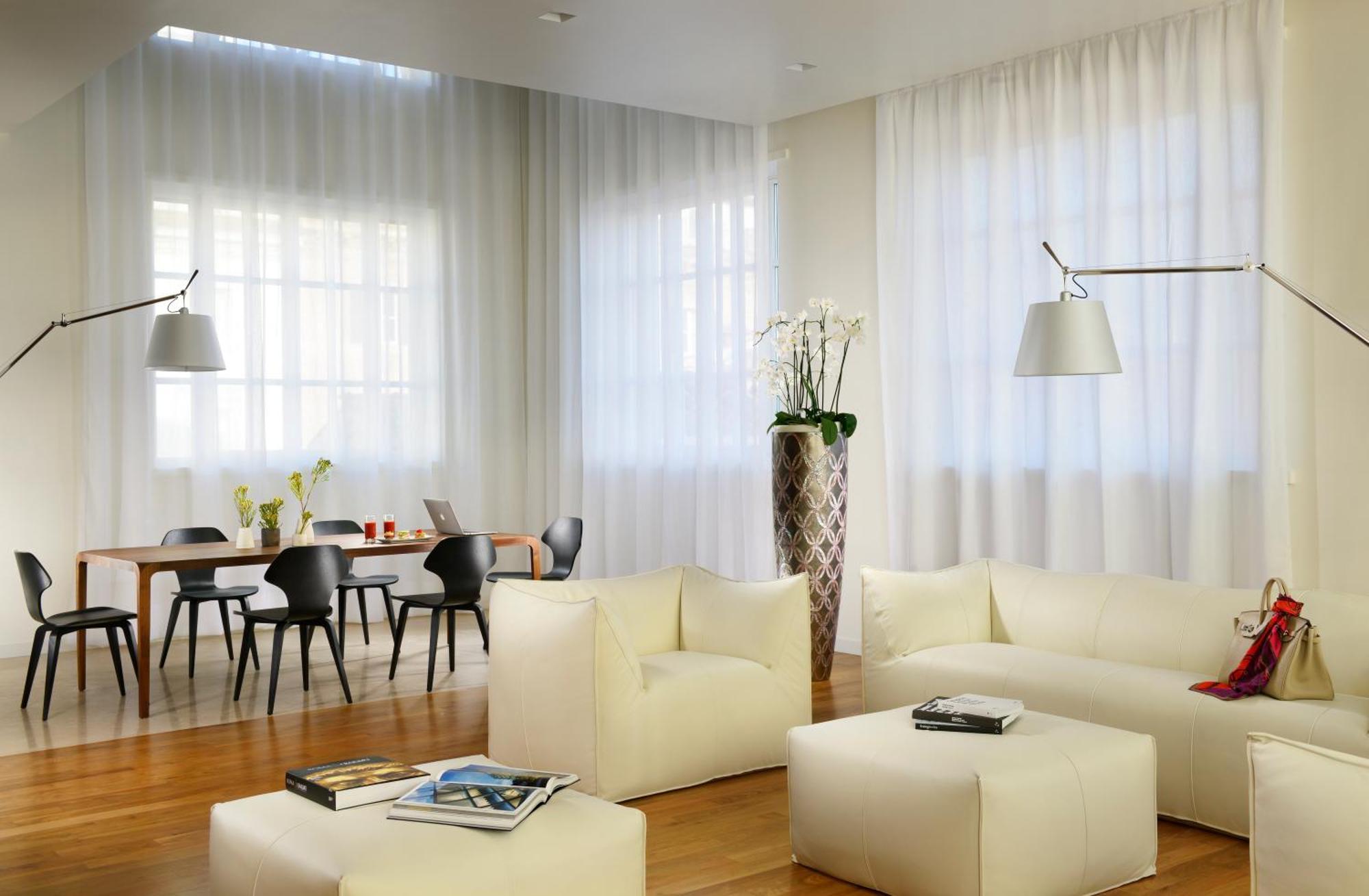 Palazzo Montemartini Rome, A Radisson Collection Hotel ภายนอก รูปภาพ A living room