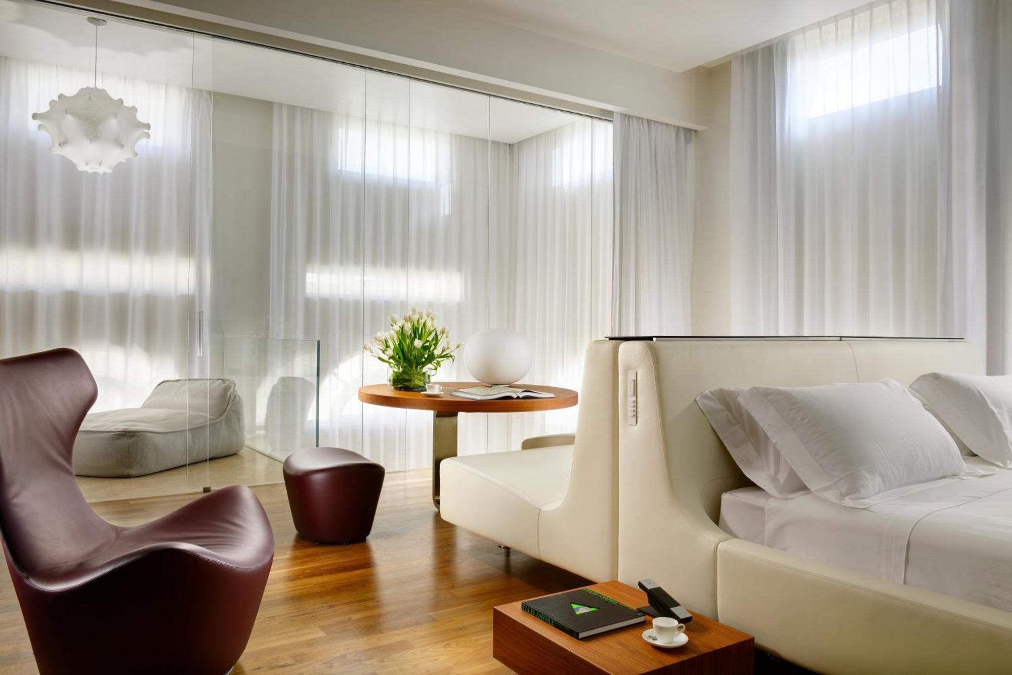 Palazzo Montemartini Rome, A Radisson Collection Hotel ภายนอก รูปภาพ A room at the Mandarin Oriental, Munich