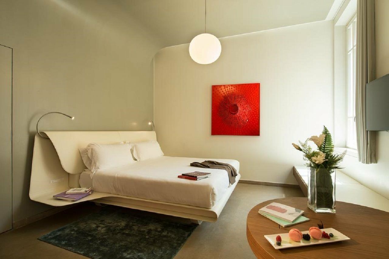 Palazzo Montemartini Rome, A Radisson Collection Hotel ภายนอก รูปภาพ A room at the hotel